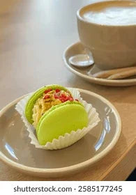 DELIZIA - كبسولات بيستاشيو ماكارون