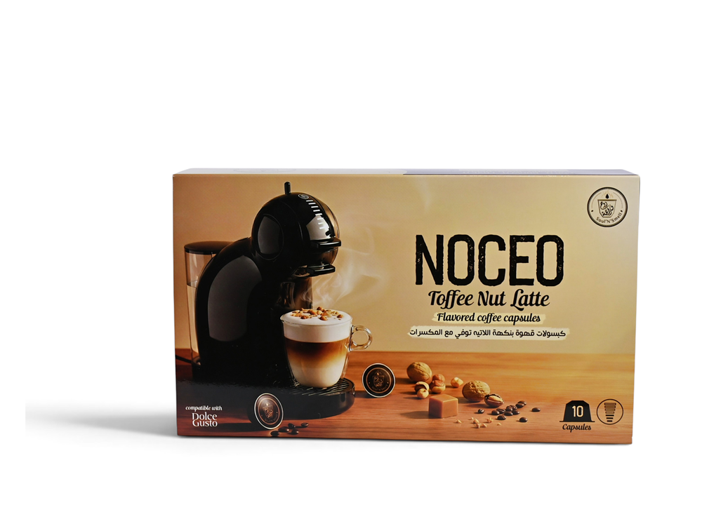 NOCEO - Toffee Nut Latte - NOCEO Toffee Nut Latte flavored coffee capsules packaging box, featuring a coffee machine and a cup of latte on a warm beige background with coffee beans and nuts.
SoulnSmell NOCEO Toffee Nut Latte Dolce Gusto compatible coffee capsule box, front view on a white background
