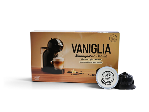 Vaniglia Madagascar Vanilla flavored coffee capsules shown with their retail box and two capsules in front on a white background.